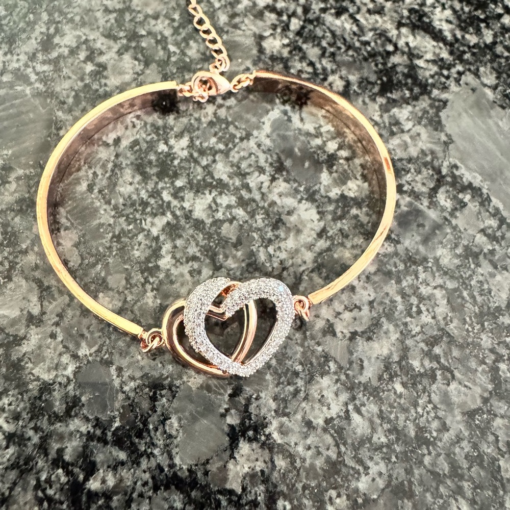 Elegant Gold and Silver Heart Bracelet